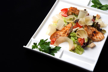 Caesar salad with cheese and herbs
