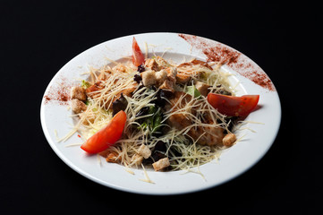 Caesar salad with cheese and herbs
