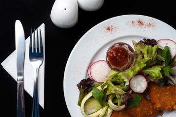 snack to beer on a large wooden plate with the sauce
