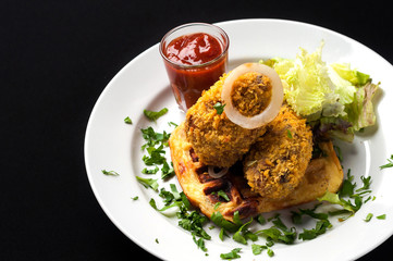 snack to beer on a large wooden plate with the sauce
