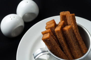 snack to beer on a large wooden plate with the sauce
