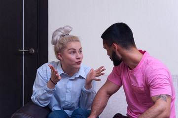 Portrait of angry couple shouting to each other