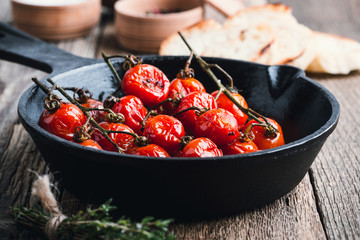 Roasted cherry tomatoes  in cast iron skillet