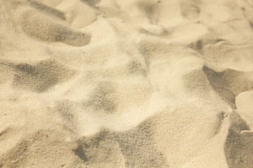 closeup of sand pattern of a beach in the summer