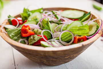 vegetable salad bowl on kitchen table, balanced diet