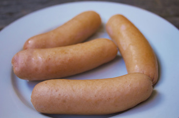 sausages on a white plate