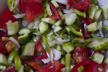Salad. Lettuce, cucumbers, tomatoes, onions, quail eggs. restaurant