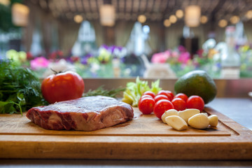 fresh raw meat with vegetables on a wooden Board for cooking