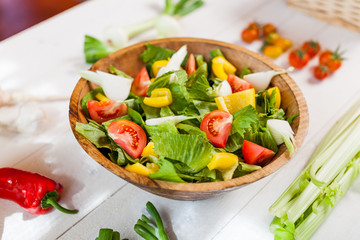 vegetable salad bowl on kitchen table, balanced diet