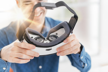 Man holding a VR viewer
