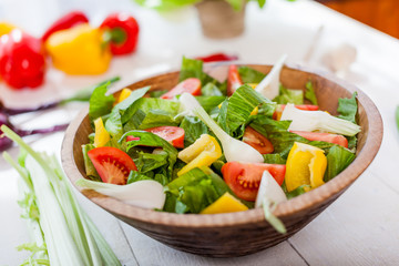 vegetable salad bowl on kitchen table, balanced diet