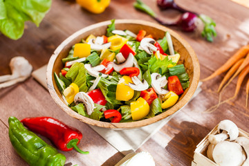 vegetable salad bowl on kitchen table, balanced diet