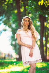 Fototapeta premium beautiful girl blonde on nature background