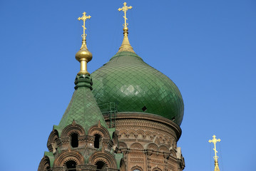 Fototapeta na wymiar Green Onion Dome of the St. Sophia Cathedral, Harbin