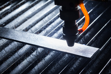 Laser makes engraving on leather belt