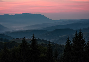reddish sky at dawn in mountains