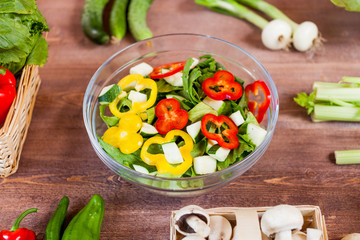 vegetable salad bowl on kitchen table, balanced diet
