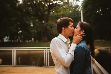 Fototapeta premium Beautiful young couple on the waterfront