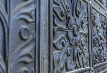 Elements of antique forging on the door.