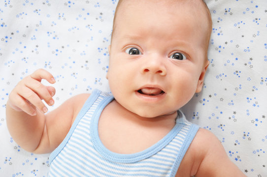 portrait of a baby in shock
