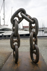 Naklejka premium Bronze chain monument at the marina in Stavanger, Norway