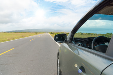 Fototapeta na wymiar car open window and stop in country roadside