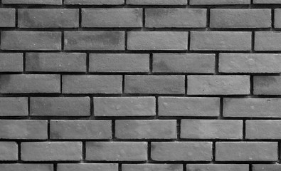 The background of the ancient brick wall is not very close together.