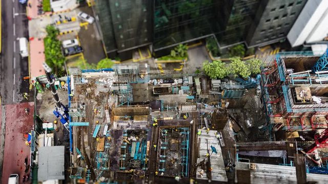 Top view of Construction site area in Kuala Lumpur, Malaysia with Miniature tilt shift lens effect time lapse
