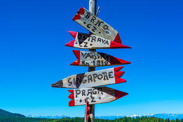 View of world sign against blue sky