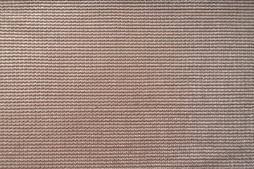 Close up of surface of pinkish cream fabric