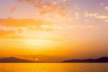 Cloudy sunset over sea