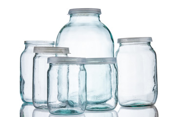 Few glass jars isolated on white background