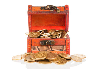 Open wooden chest with golden coins on white background