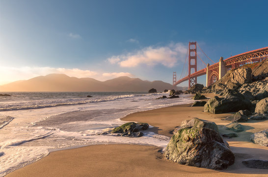 San Francisco Golden Gate Bridge at sunset from Marshall beach in California USA