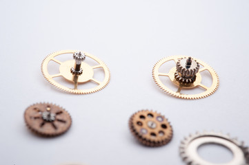 Detail of watch machinery on the table. 