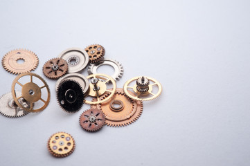 Detail of watch machinery on the table. 