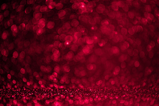 Red defocused abstract glittery backgroun