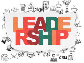 Finance concept: Leadership on Torn Paper background