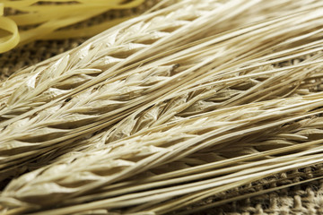 Uncooked spaghetti on table