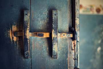 old wooden door with door handle