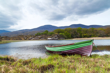 Fototapeta na wymiar Boat at the Killarney lake in Co. Kerry, Ireland