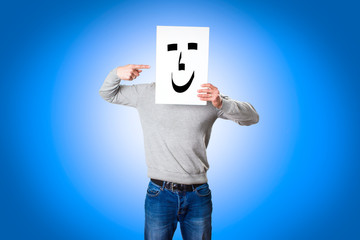 Happy man with a sheet of paper on his face