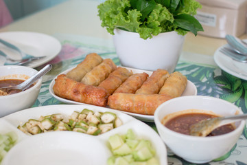 Nham nueng is vietnamese food consist of many vegetables and meatball wrapped in noodle with sauce.