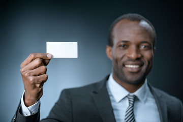 african american businessman with business card