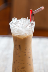 Cold Espresso Coffee on wooden table.