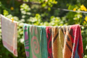 Hanging towels in the garden on a line