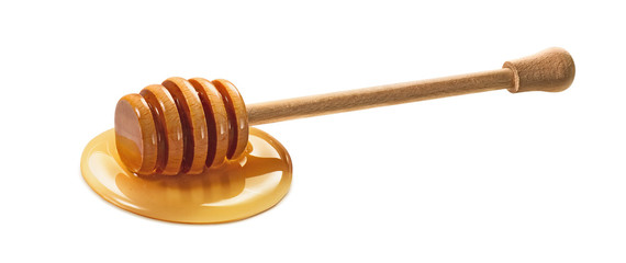 Wooden dipper in honey isolated on white - Powered by Adobe