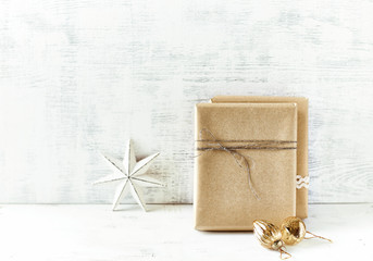 An Arrangement of Christmas Presents wrapped in gift paper in natural shades a