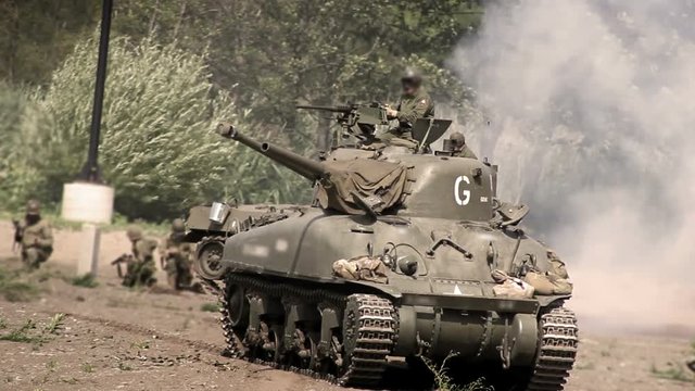 World War Two - American Sherman Firefly shielding American Troops during battle