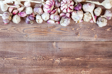 Garlic. Garlic Cloves and Garlic Bulb on a wooden vintage rustic table. Top View. Copy Space